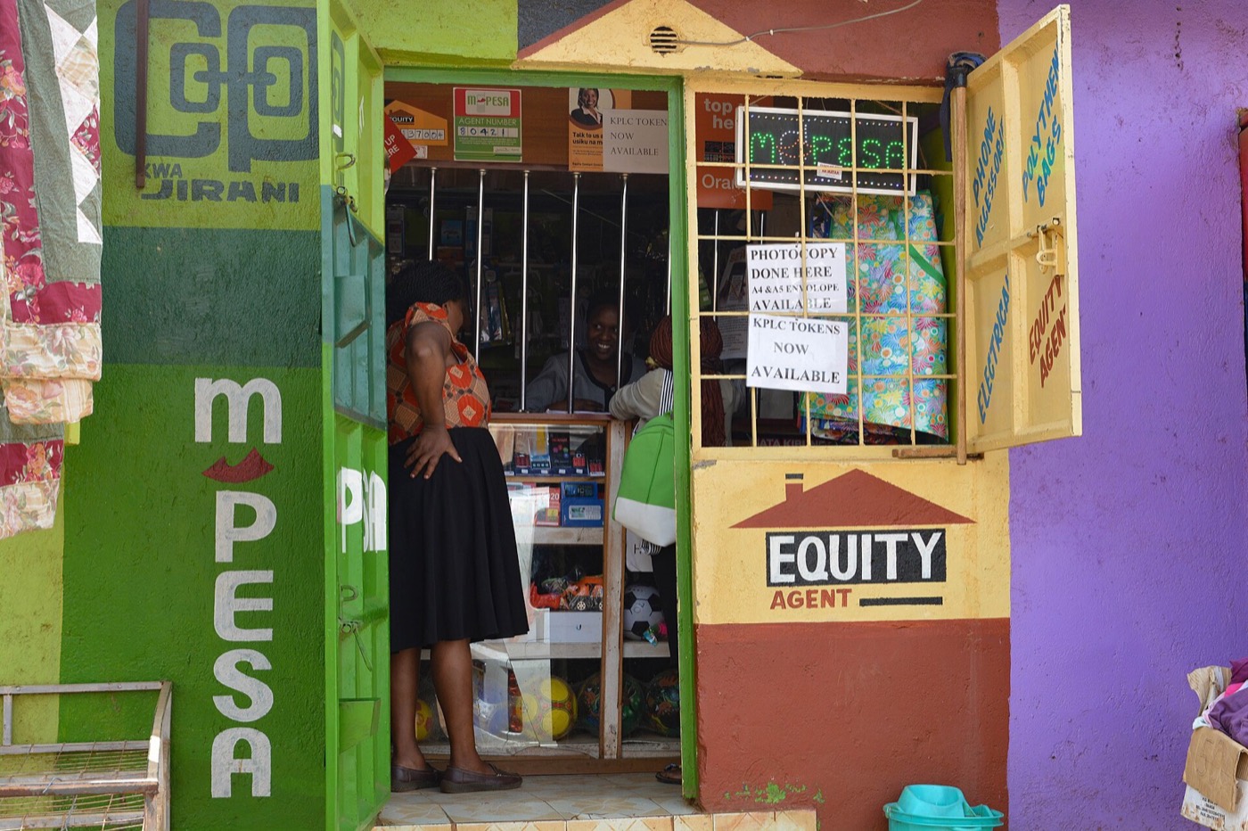 An M-Pesa and bank agent shopfront on a Nairobi street