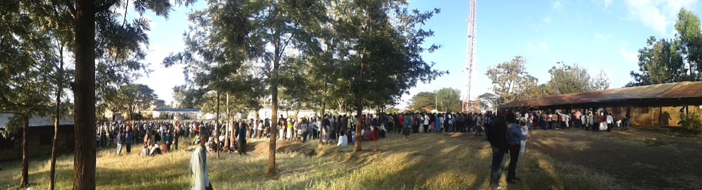 A long queue of voters waiting outside a polling centre in Kenya